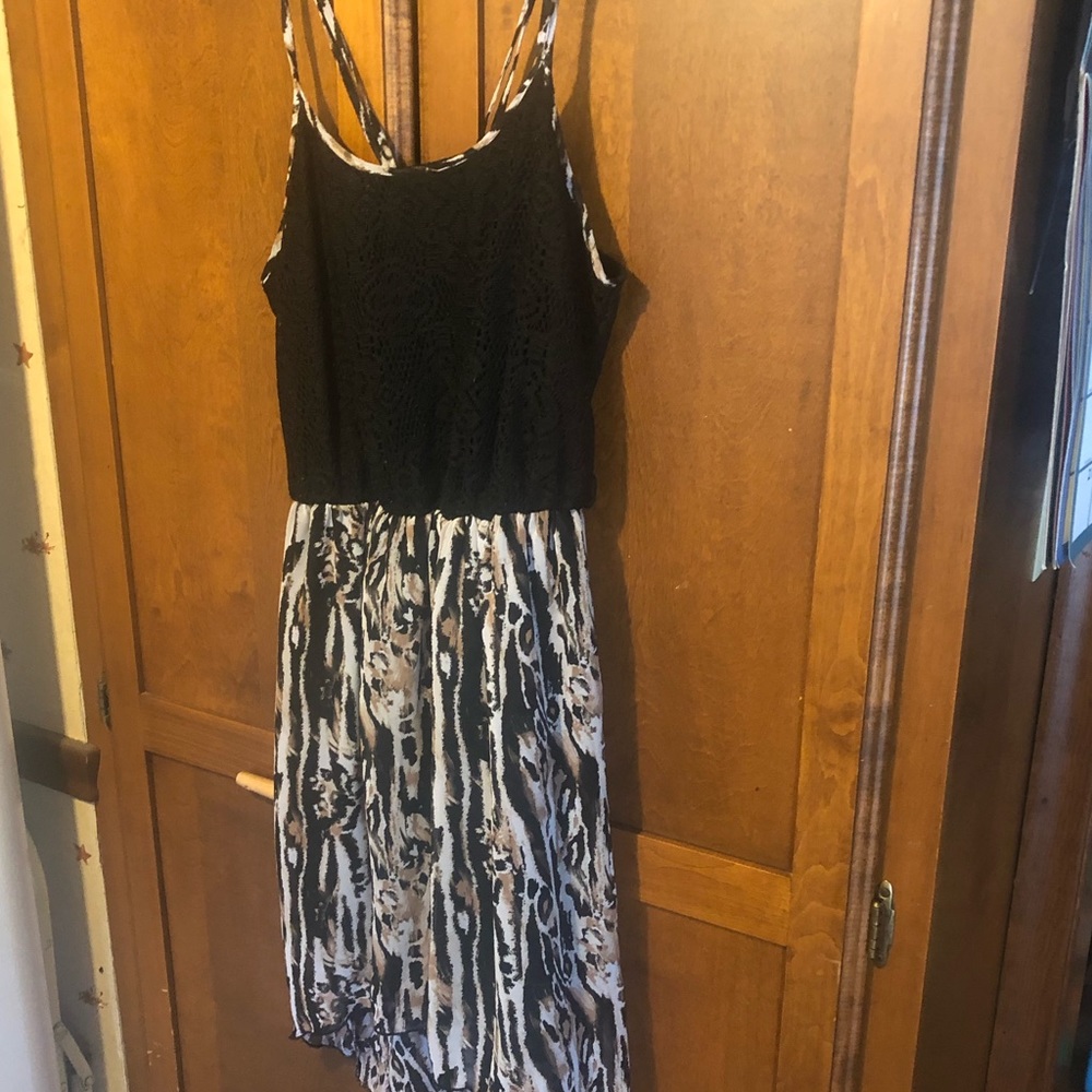 High low camisole sun dress with animal print bottom and black lace top.